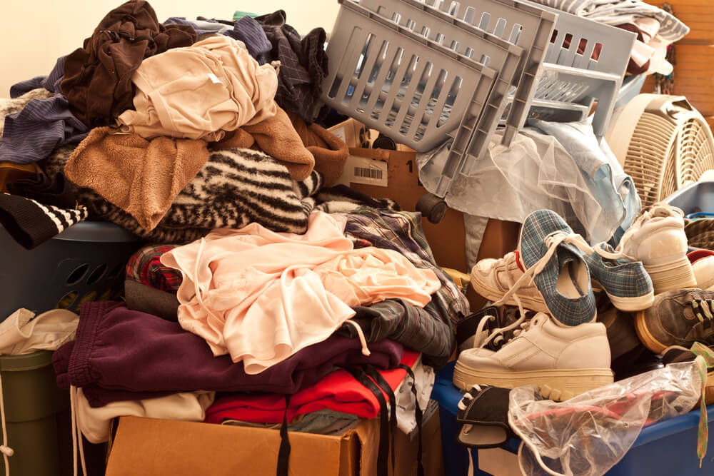 Pile of misc items stored in an unorganized fashion in a room