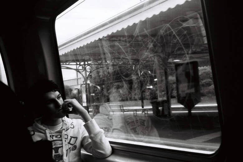 Man sitting on train