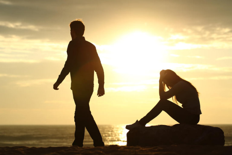 man walking away from sad woman