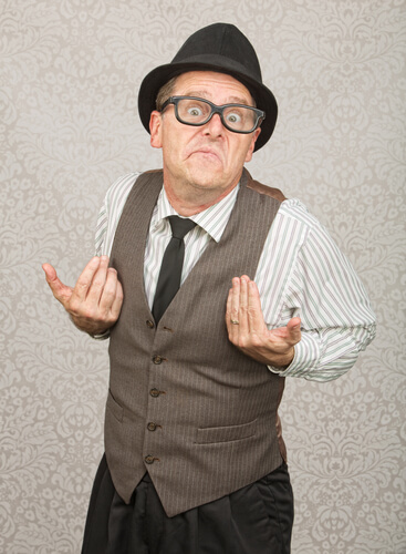 Upset white businessman with hat and eyeglasses