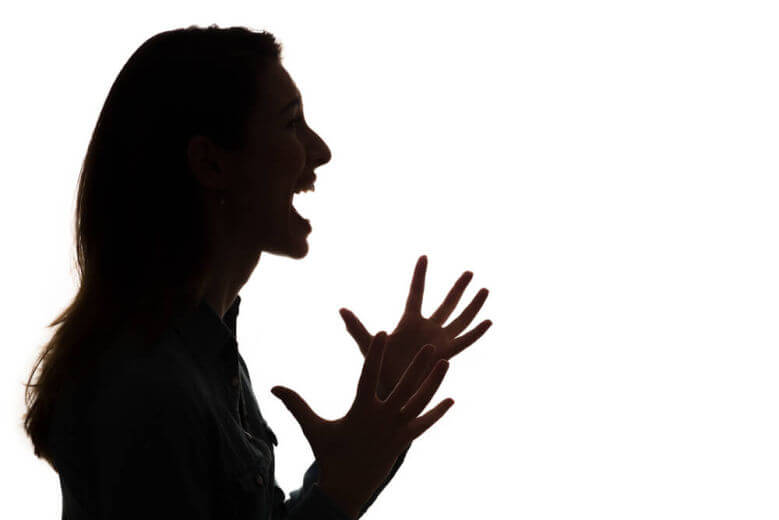Silhouette of woman screaming