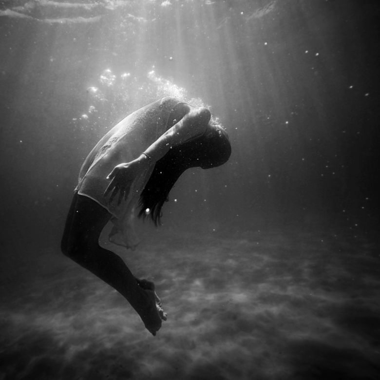 woman-with-white-dress-under-water