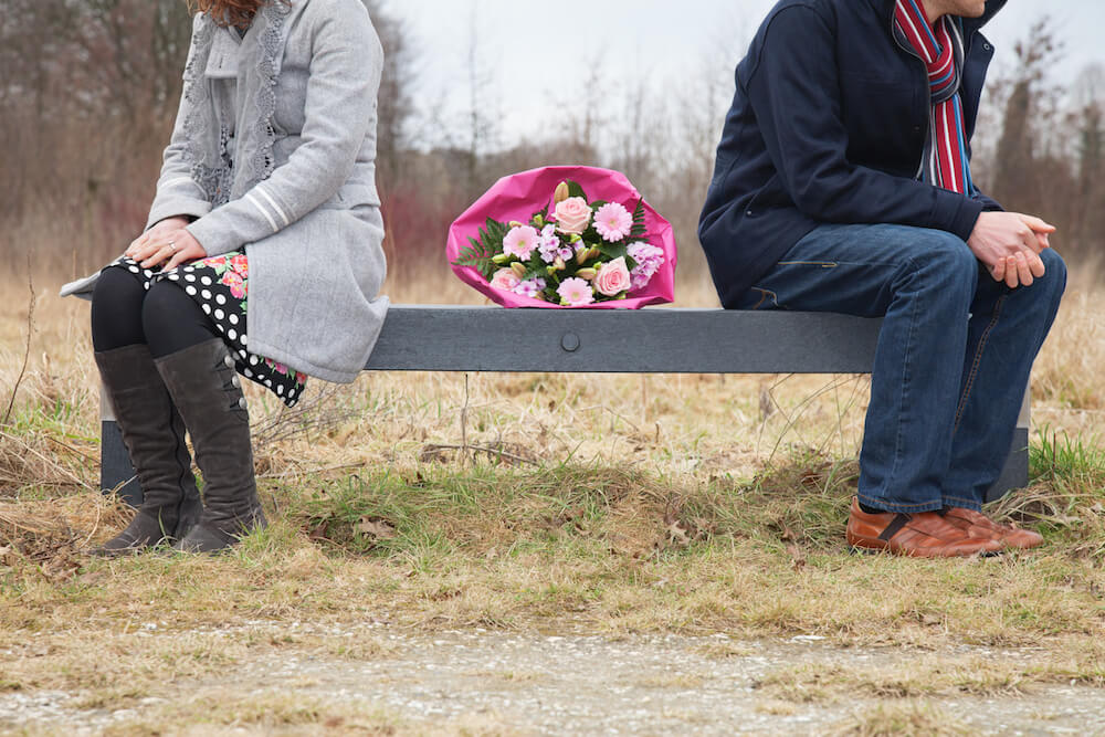 How to let go - couple on a bench with flowers