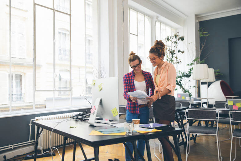 How to find the perfect career - Two women working together in office