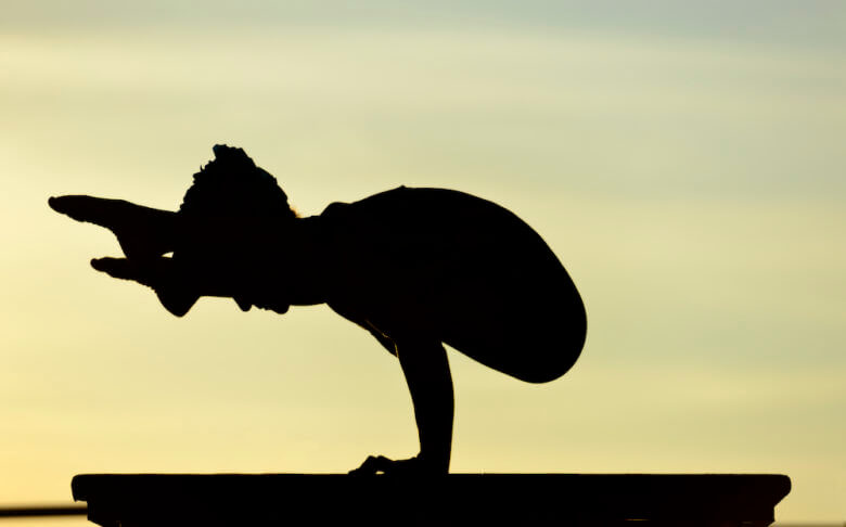 Resilience: woman contortionist practicing 