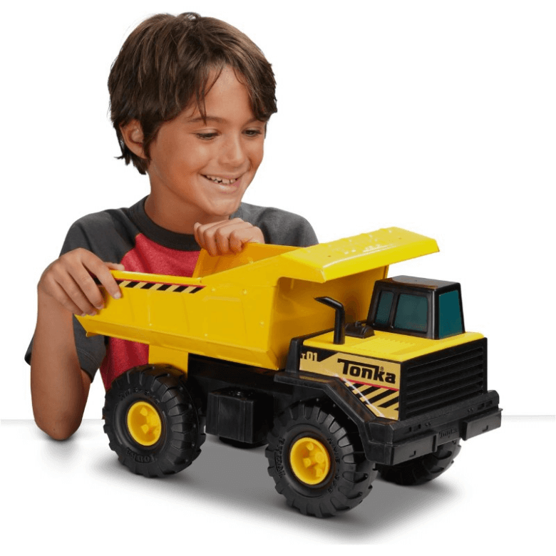 Boy playing with truck