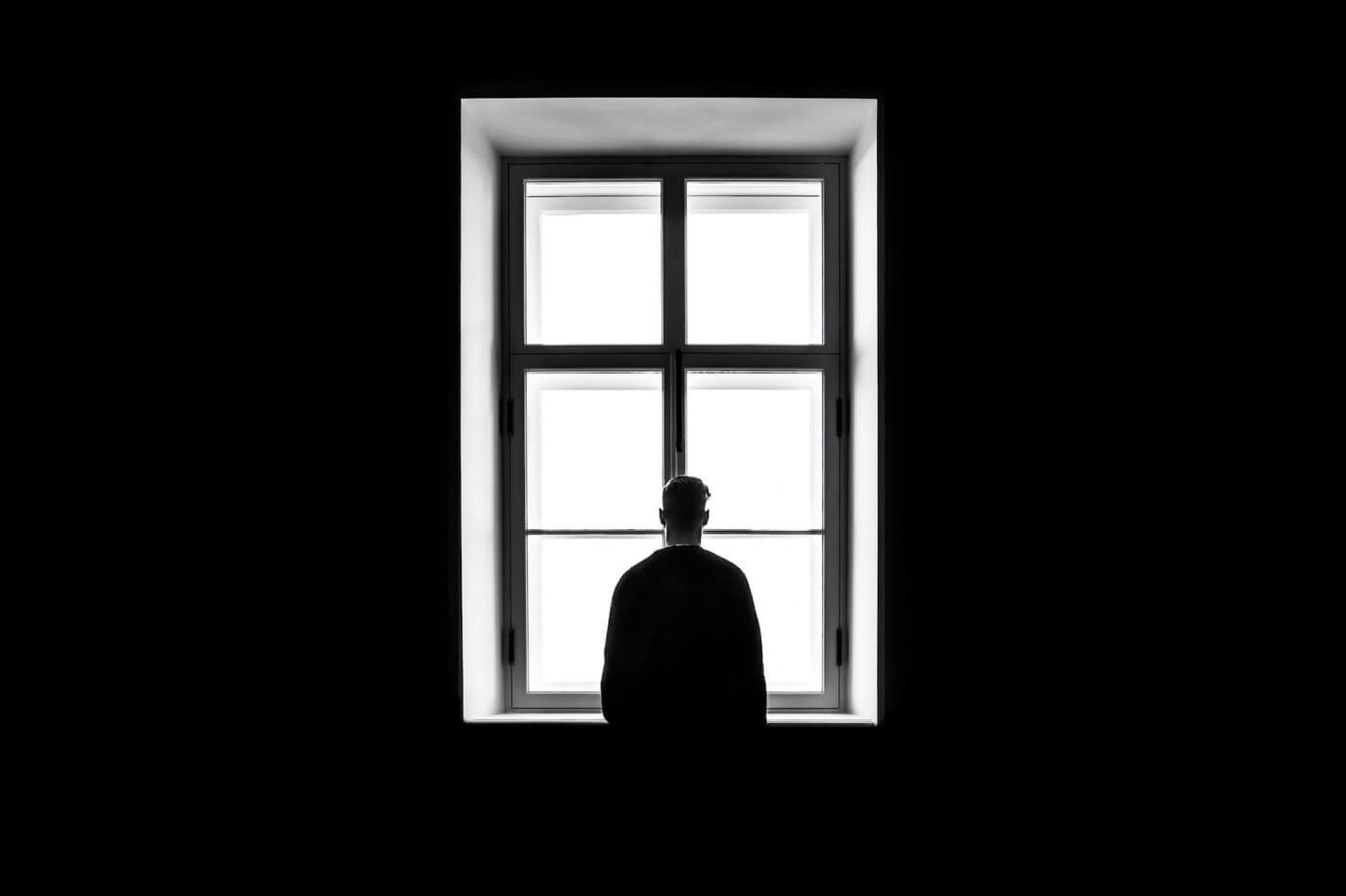 lonely man by the window